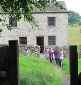 The kids exploring the garden of the Reckoning House in the Derbyshire Dales