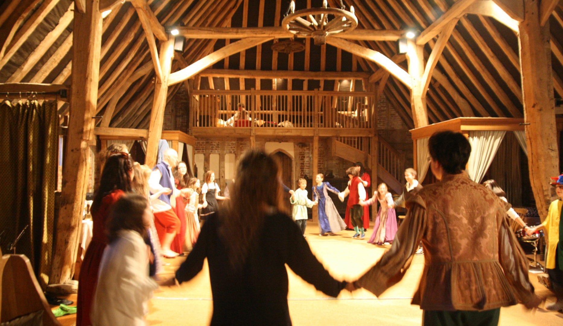 Tudor dancing in historic Tudor Barn Hostel at Milden Hall, nr Lavenham, Suffolk