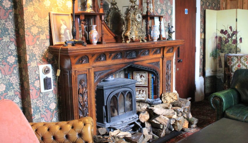 log burner and lounge at craig y nos castle on The Beacons Way