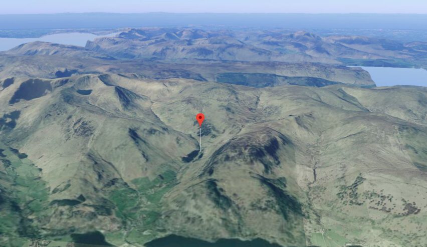 Pin location of Almond Lodge on the side of Helvellyn within the landscape of the Lake District