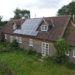 Exterior view of StationCottage Colwall, Eco Hostell, showing the solar panels on the roof