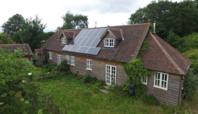 Exterior view of StationCottage Colwall, Eco Hostell, showing the solar panels on the roof