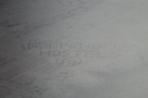 IHUK logo in sand 