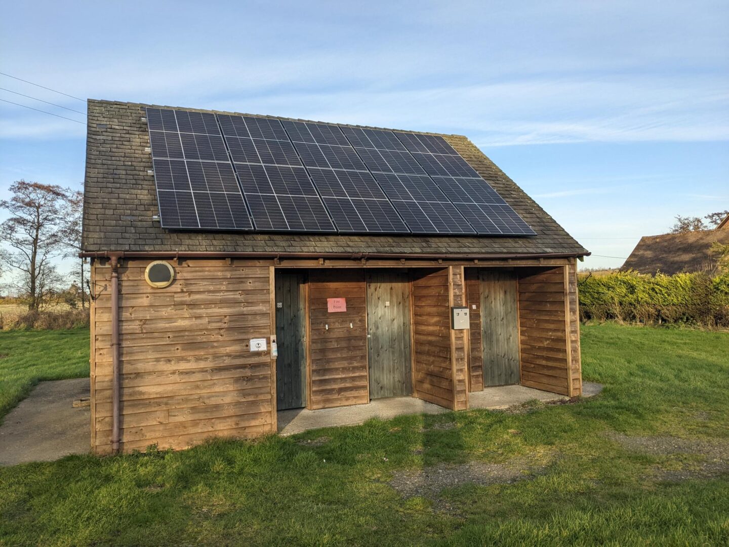 the farm hostel with solar panels on the roof