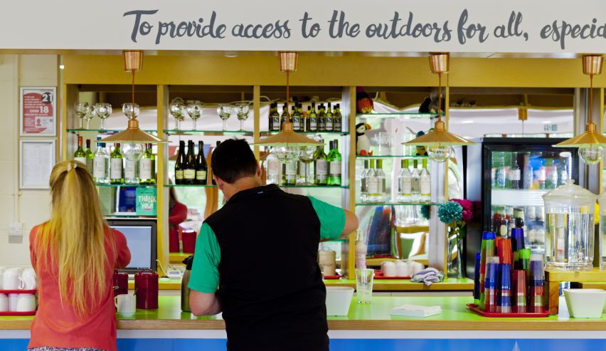 The bar with the banner above saying, @To provide access to the outside to all'