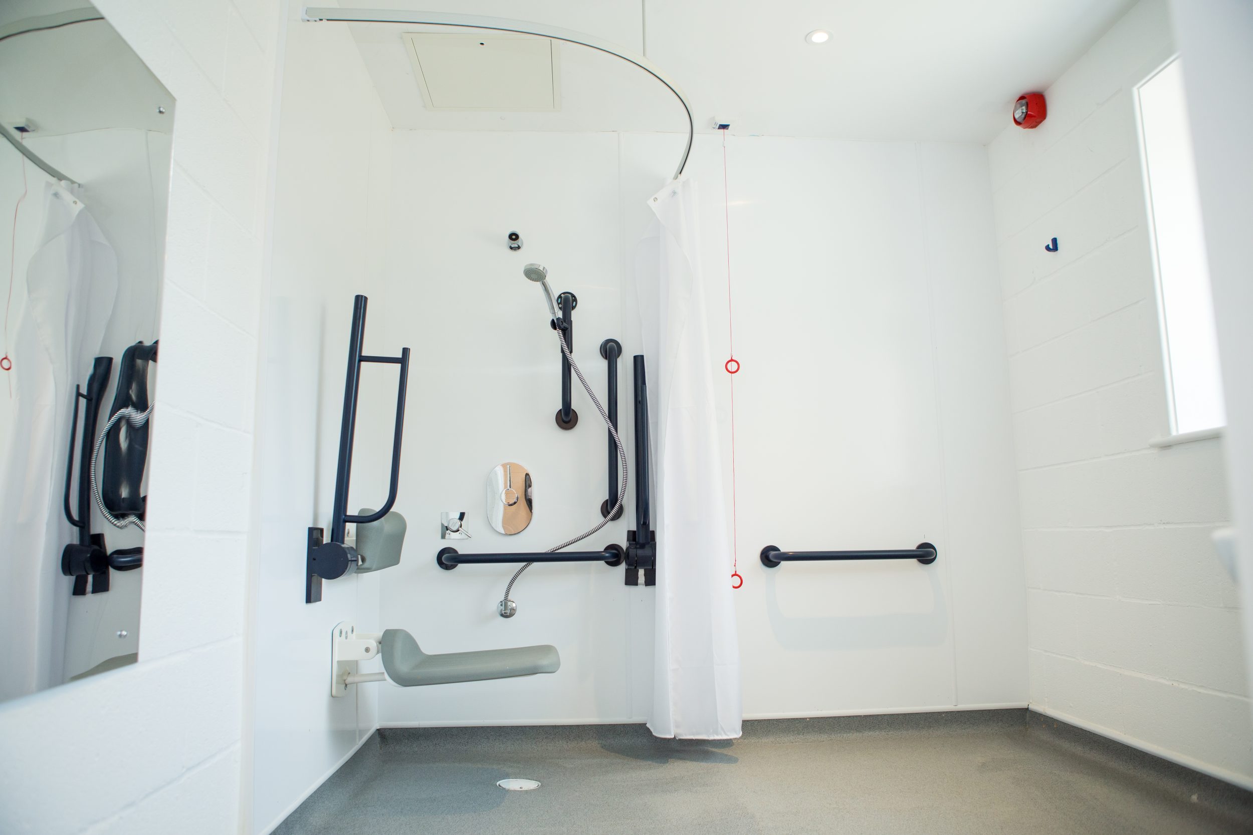 An image of Mount cook's disabled access sit down shower
