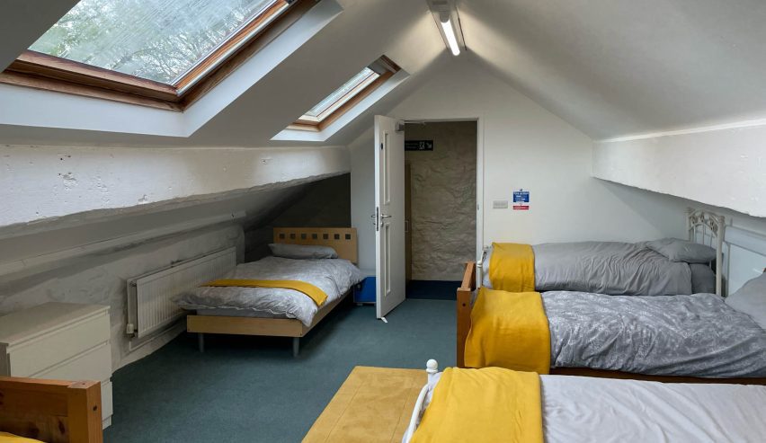 Dorm room in the eaves with single beds