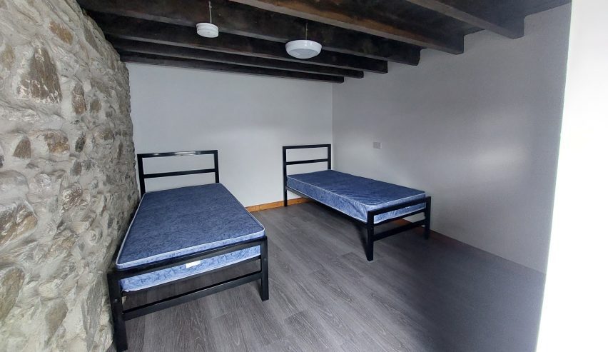 Bedroom with double and single bed
