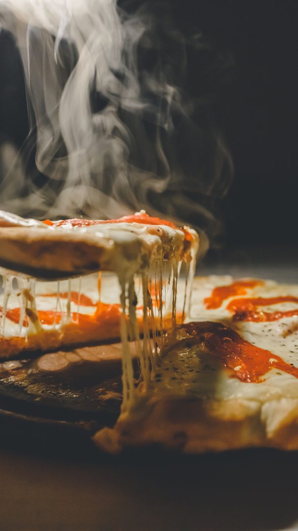 Steaming hot pizza