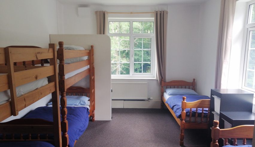 Small dorm with bunks and single bed
