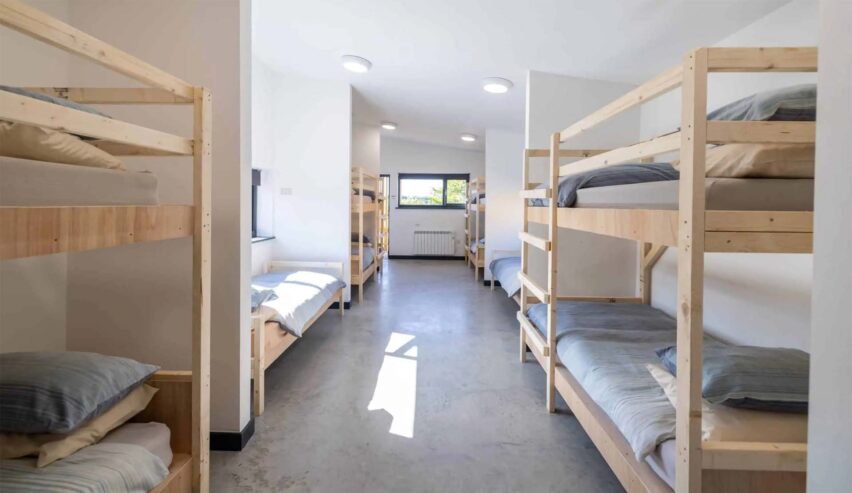 bed in a shared sleeping room at Calvert Devon Lodges